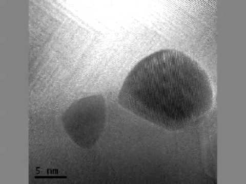 Watch Atoms of Gold on FeO Move Under an Electron Microscope